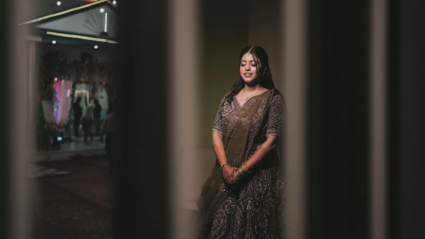 Romantic couple exchanging rings during their engagement, captured by DesignInfo Photography