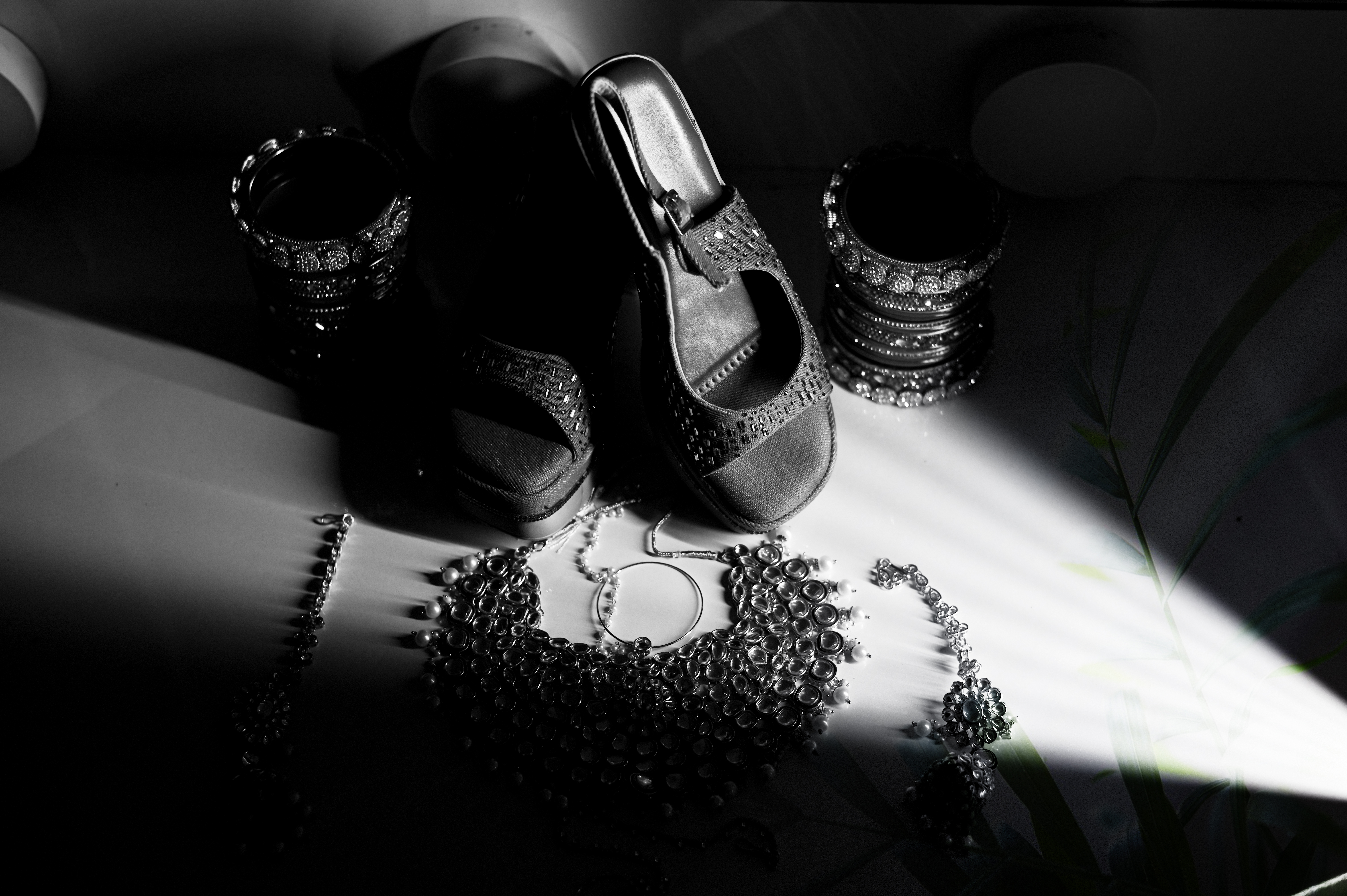 Romantic couple exchanging rings during their engagement, captured by DesignInfo Photography.